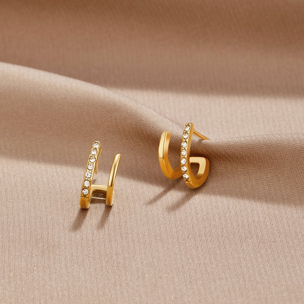 Garra – Pendientes Oro 18 k y Cristal